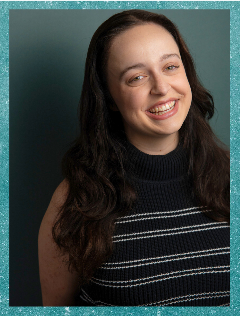 A person smiling and looking at the camera
